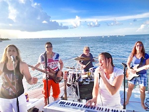 Sister Funk playing live during a sunset sail around Key West. 